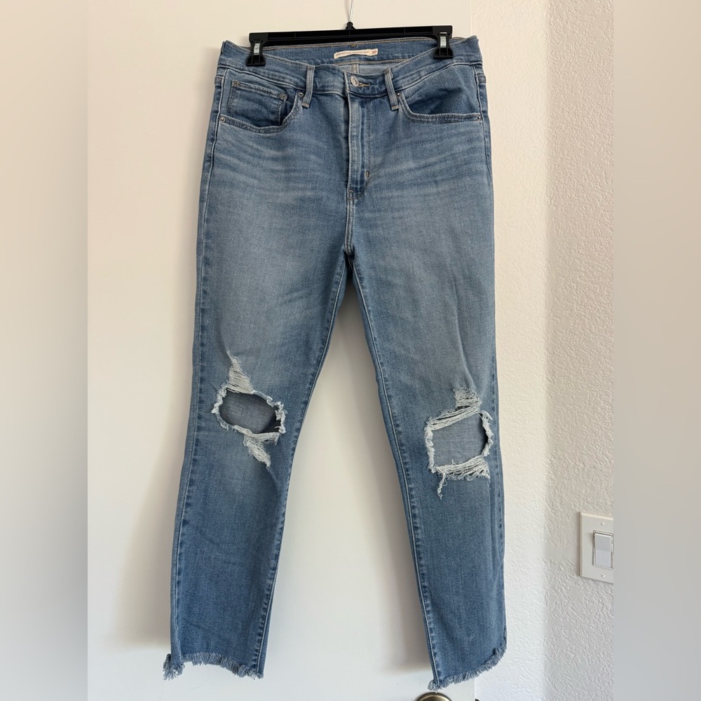 Levi's Light Blue Distressed Skinny Jeans